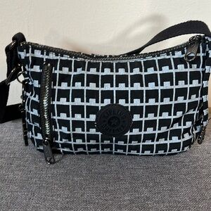 Kipling small shoulder purse 6" H X 9" W X 3" D